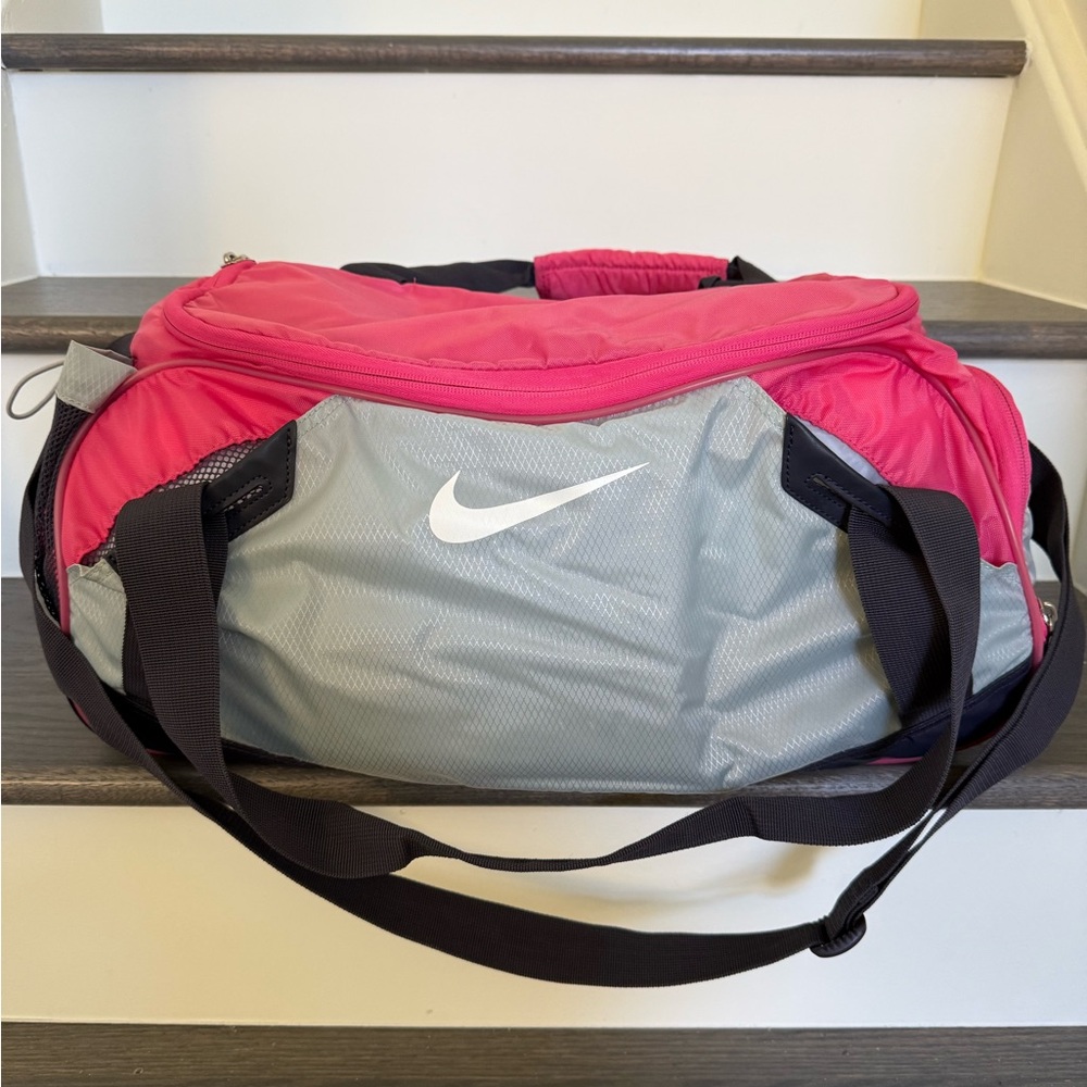 Nike Pink and Gray Sports Duffel.